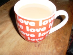 Mug of tea with "love" all over it